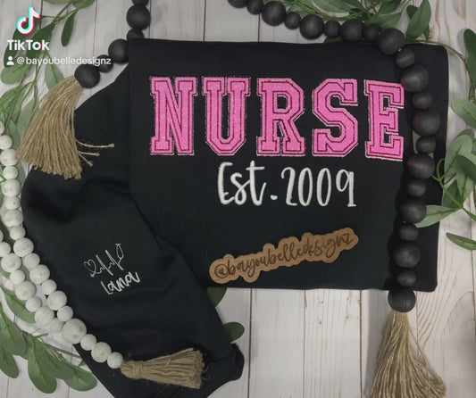 Nurse embroidered sweatshirt w/add-on sleeve embroidery